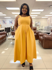 Mustard yellow pleated sleeveless midi dress with high waist seam