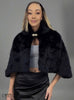Black fur cape jacket with crystal clasp at neck, short sleeves