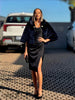 Black faux fur cropped cape jacket with brooch accent at neckline