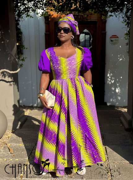 Purple geometric print maxi dress with puff sleeves and flared skirt