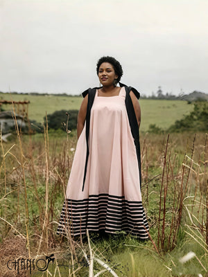 Pink square-neck sleeveless maxi dress with black striped panel hem