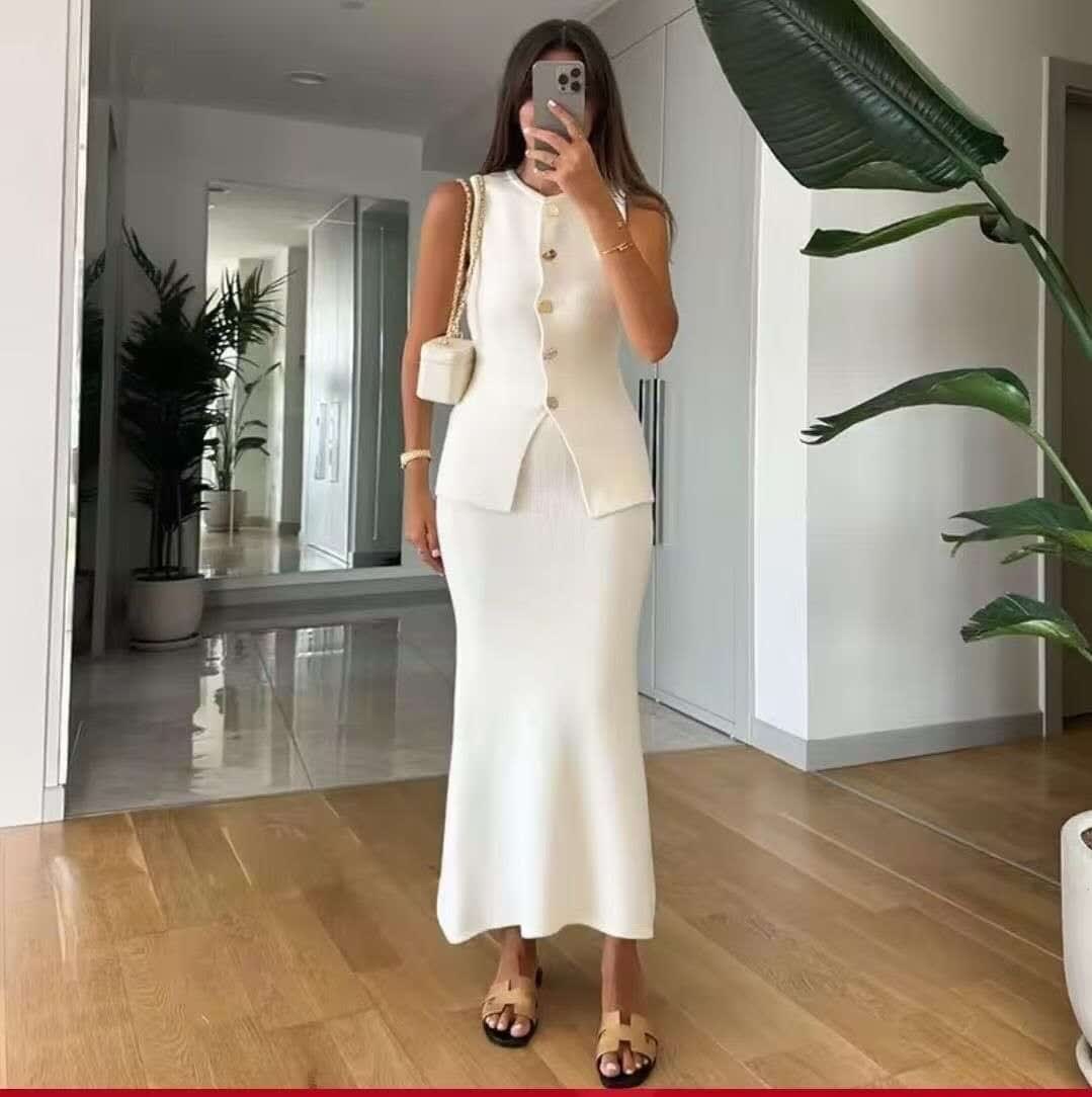 White sleeveless knit cardigan set with button front and matching long skirt