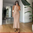 Beige sleeveless knit cardigan set with button front and matching long skirt