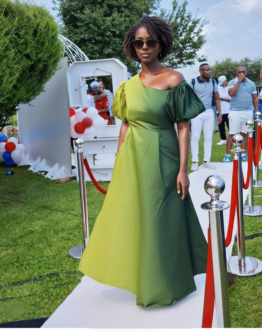 Lime green one-shoulder maxi dress with puff sleeves and A-line skirt