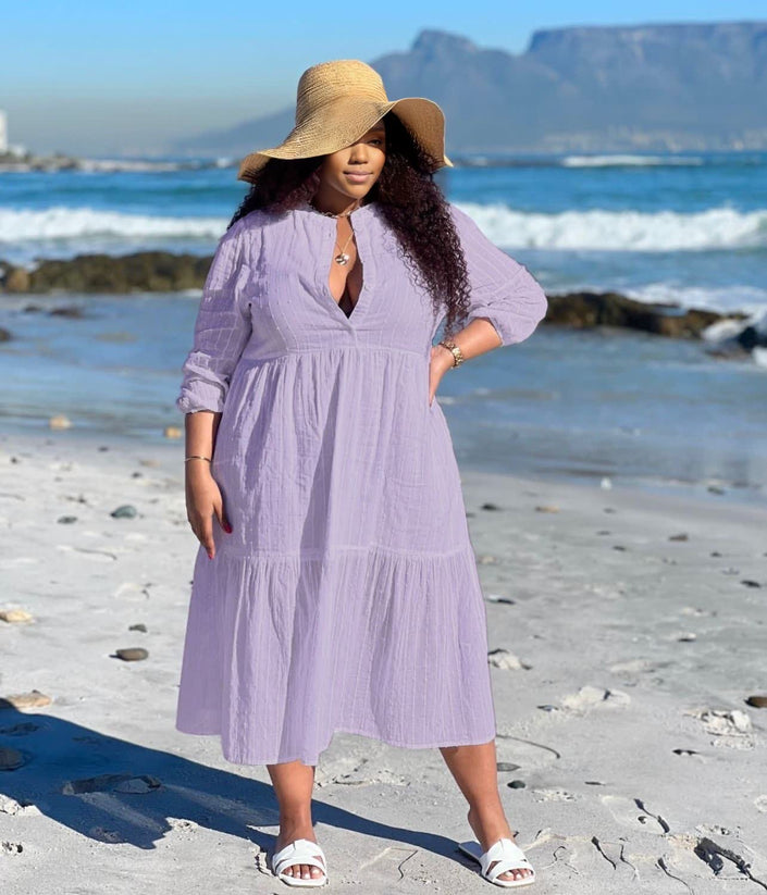 Light purple tiered maxi dress with V-neck and three-quarter sleeves