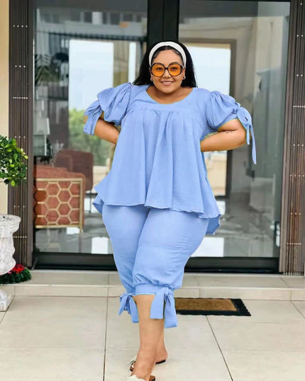 Light blue ruffle-sleeve two-piece set with layered top and drawstring waist pants