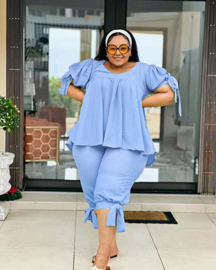 Light blue ruffle-sleeve two-piece set with layered top and drawstring waist pants