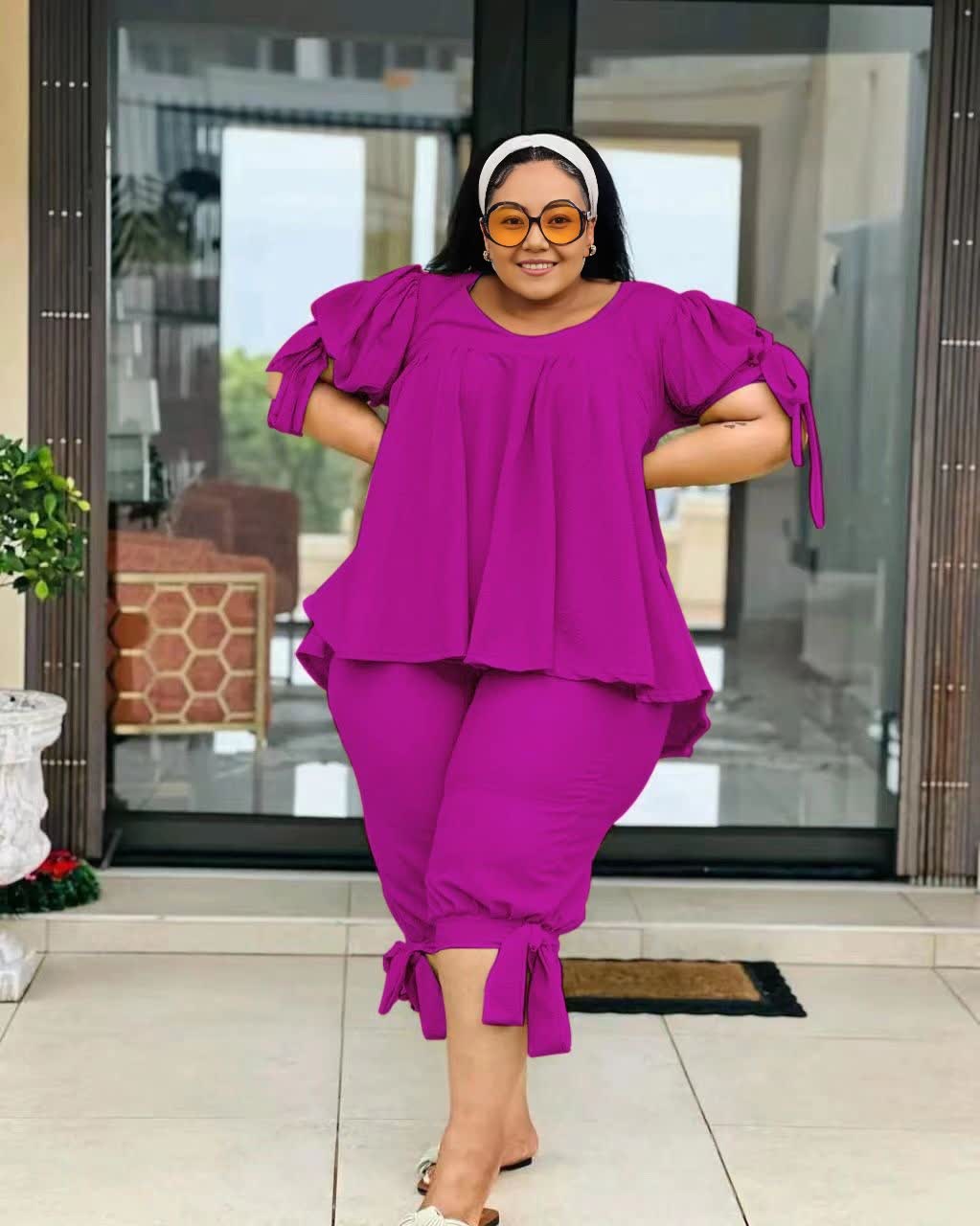 Magenta ruffle-sleeve two-piece set with layered top and drawstring waist pants