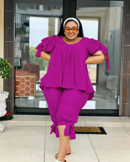 Magenta ruffle-sleeve two-piece set with layered top and drawstring waist pants