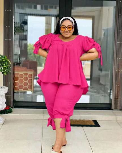 Deep pink ruffle-sleeve two-piece set with layered top and drawstring waist pants