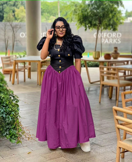 Puff sleeve maxi dress with black button bodice and pleated A-line purple skirt