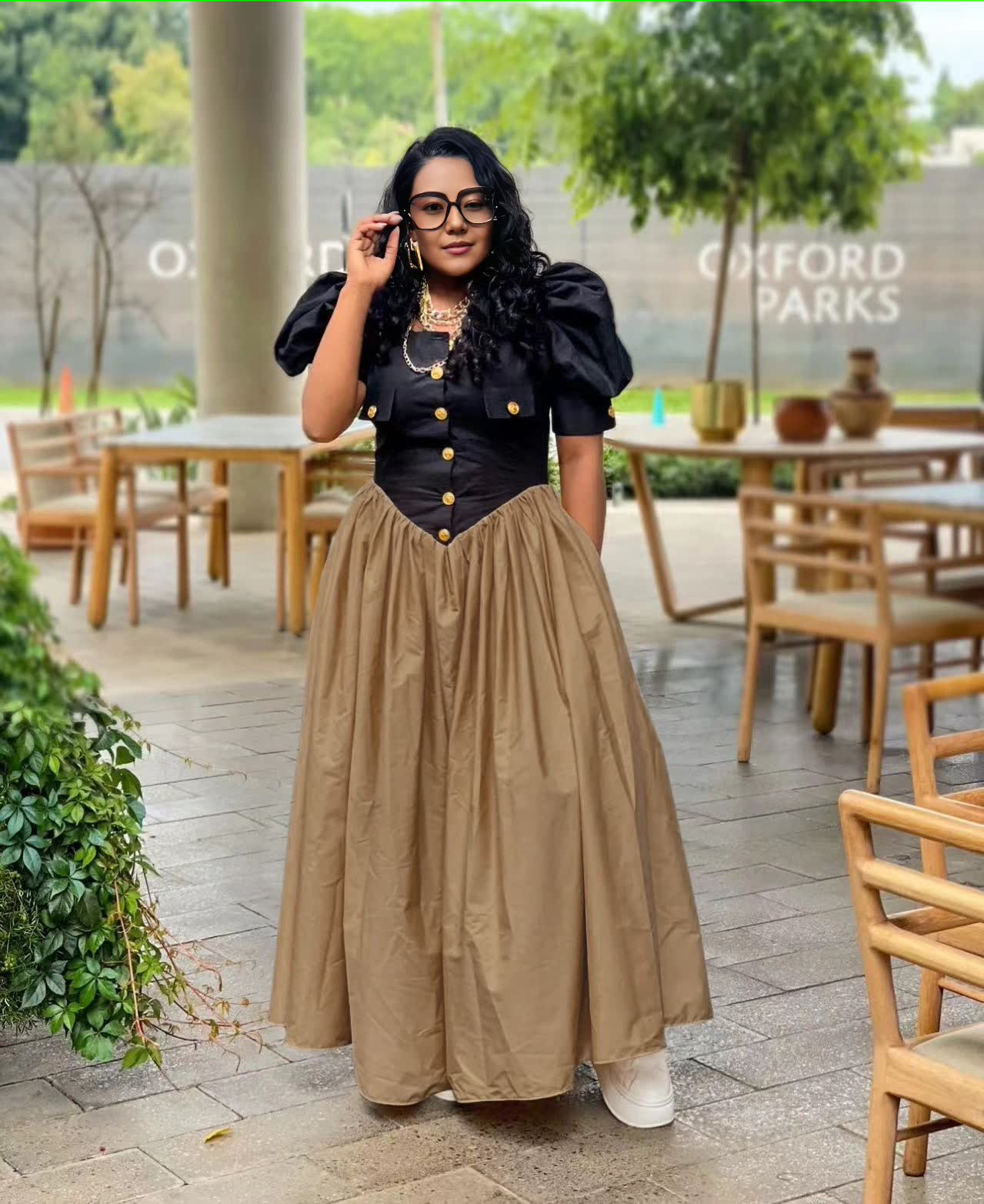 Puff sleeve maxi dress with black button bodice and pleated A-line khaki skirt