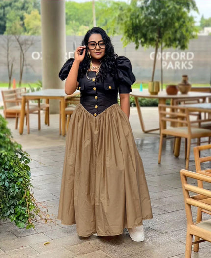 Puff sleeve maxi dress with black button bodice and pleated A-line khaki skirt