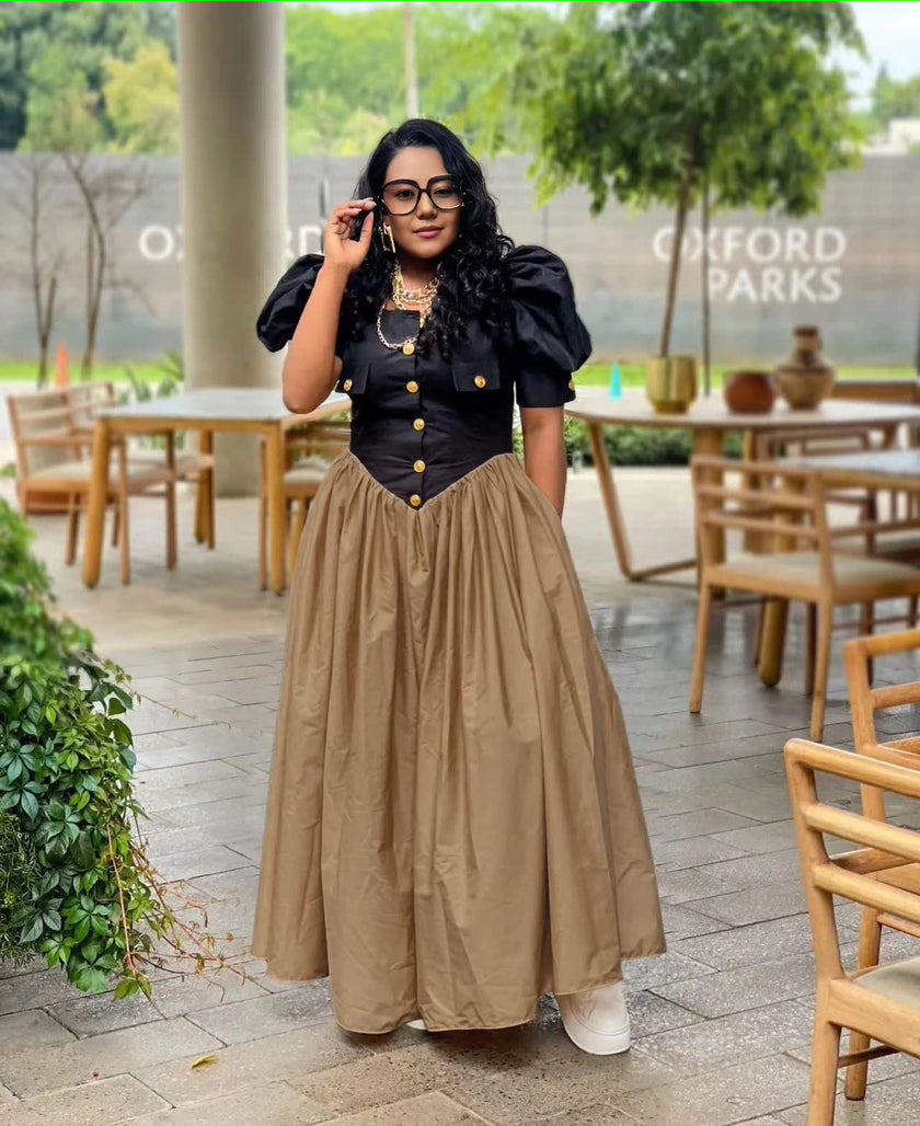 Puff sleeve maxi dress with black button bodice and pleated A-line khaki skirt