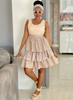 Round Neckline Knee-Length Dress Featuring Circular Motifs and Ruffled Layers