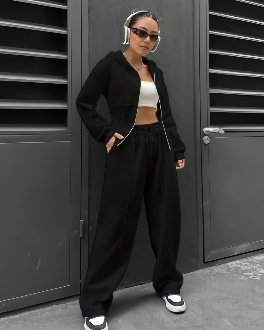 Black hooded zip-up twin set with drawstring jogger pants, loose fit