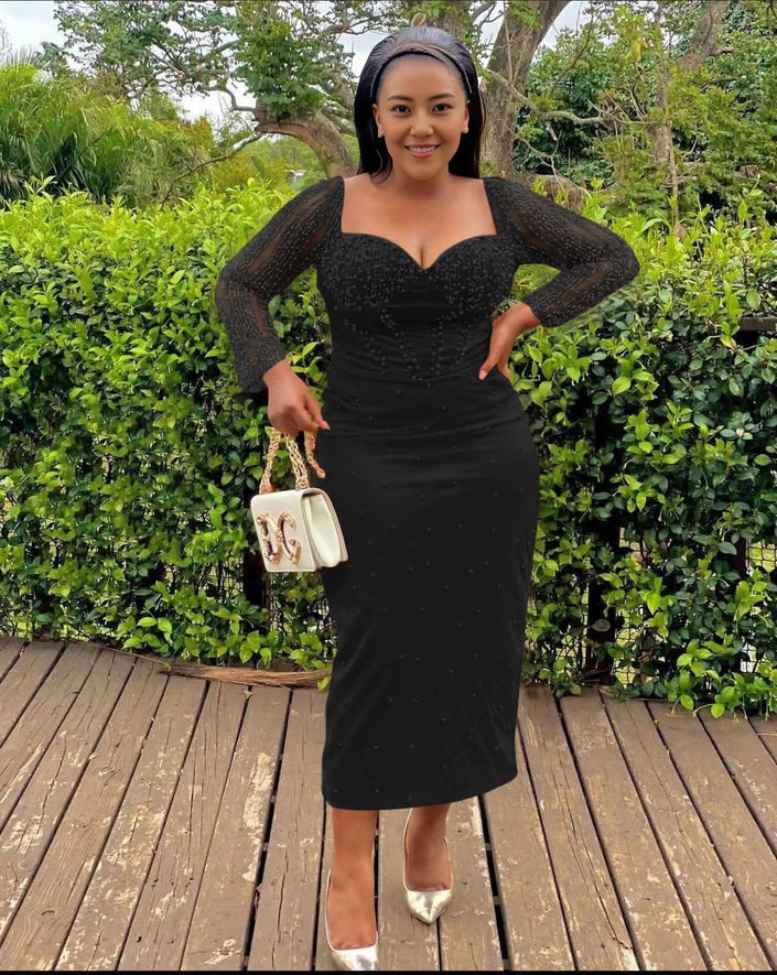 Black sequin sheath midi dress, V-neck, long sleeves, pencil midi hem.