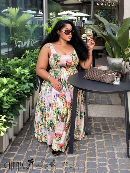 Pink floral maxi dress with square neck and wide shoulder straps, sleeveless, gathered skirt