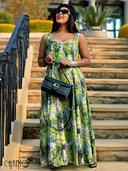 Green floral maxi dress with square neck and wide shoulder straps, sleeveless, flowing skirt