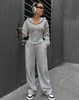 Light gray hooded zip-up twin set with drawstring jogger pants, loose fit