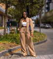 Beige contrast-piping zip tracksuit jacket with matching wide-leg drawstring pants