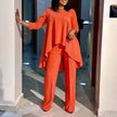 Orange-red loose long-sleeve blouse and wide-leg trousers set, asymmetrical hem