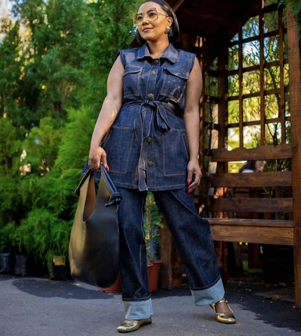 Denim twin set: belted sleeveless jacket with button front and cuffed jeans