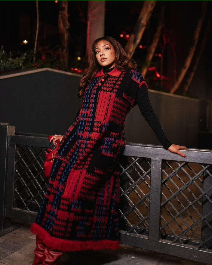 Plaid knit midi dress with fringe hem, red and navy check with long black sleeves