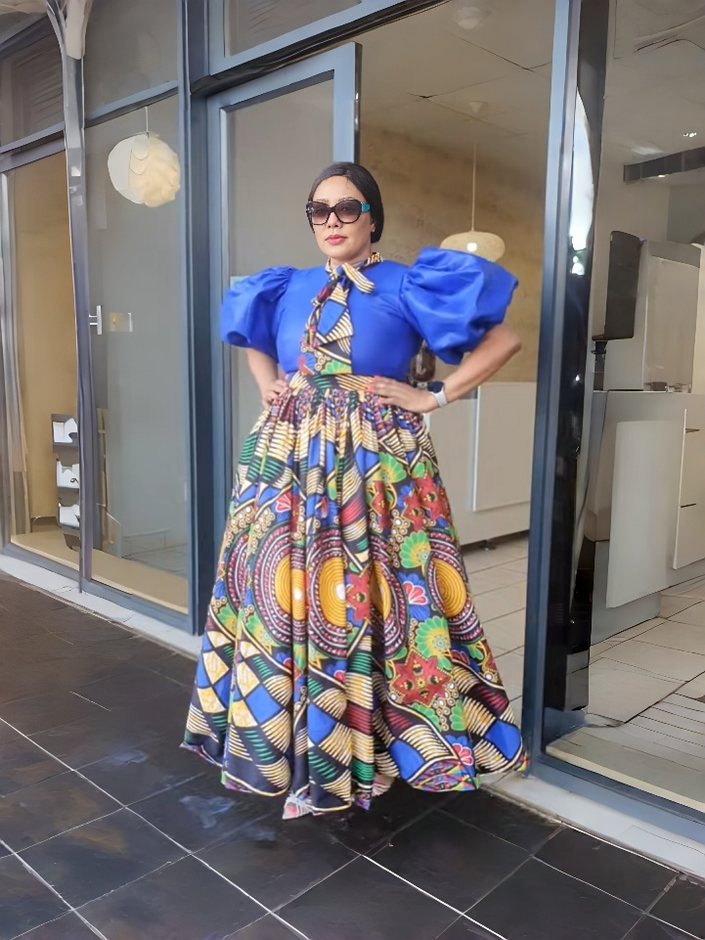 Blue patterned maxi dress with puff sleeves and full skirt