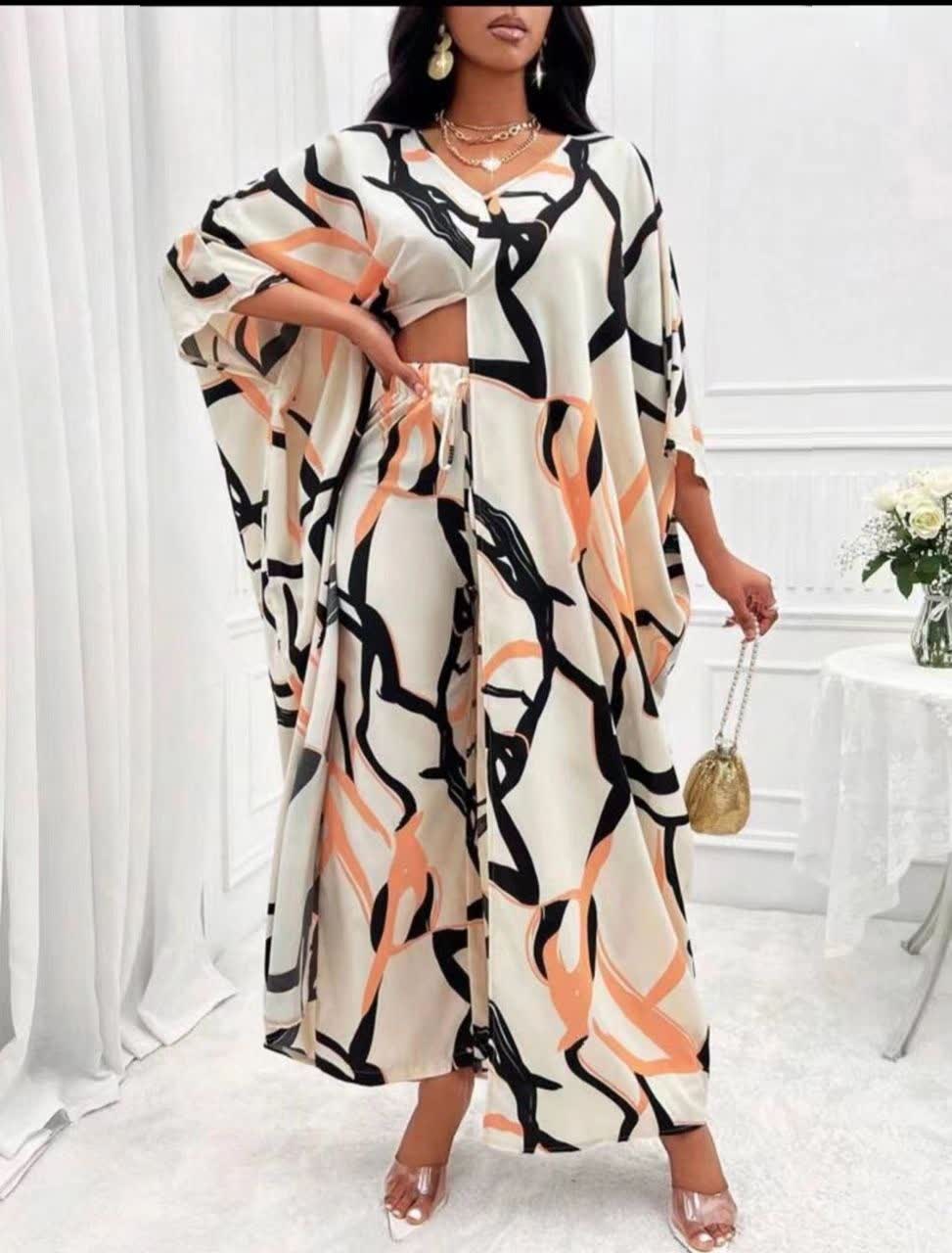 Abstract print kaftan-style dress with wide sleeves and V-neck