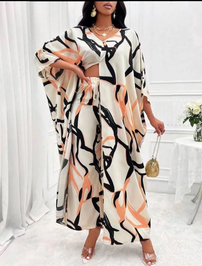 Abstract print kaftan-style dress with wide sleeves and V-neck