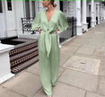 Light-green V-neck puff-sleeve maxi dress with tie waist and button front