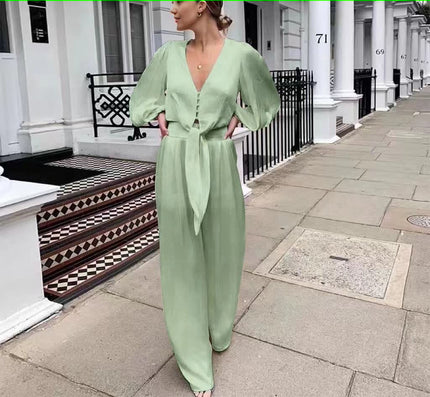 Lime-green V-neck jumpsuit, puff sleeves, adjustable waist tie, wide legs
