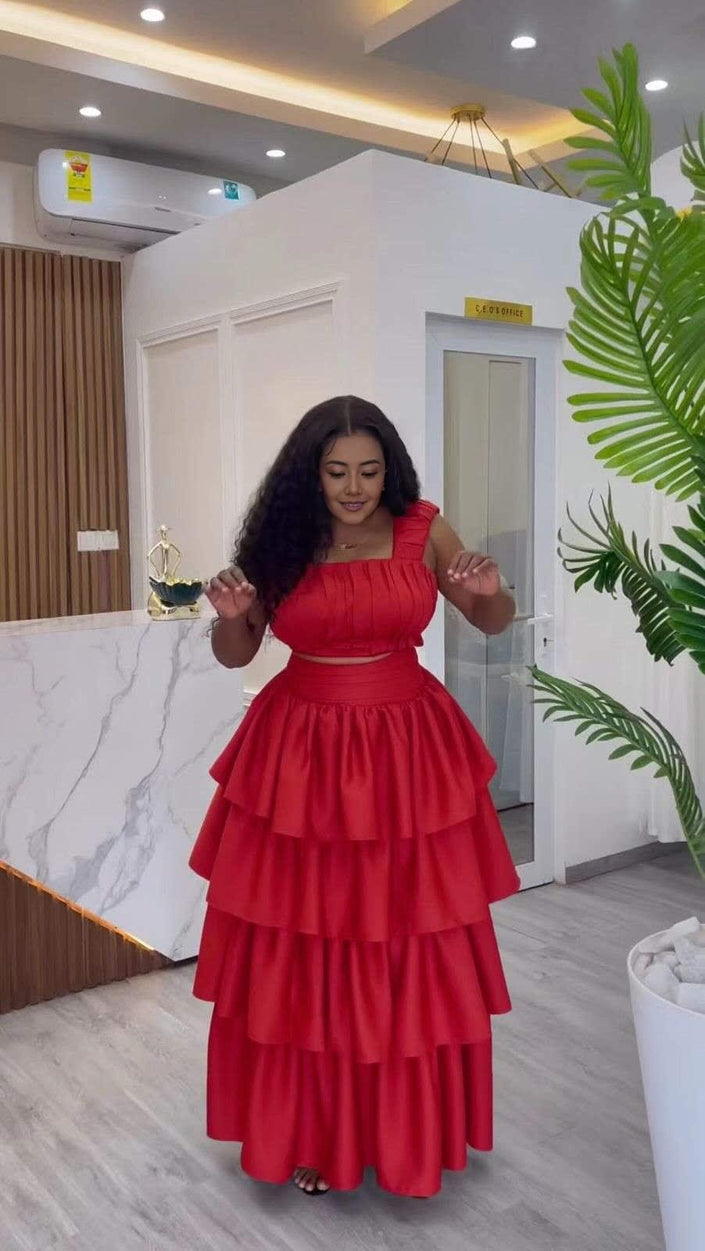 Red ruffle tiered maxi dress with smocked bodice and off-shoulder sleeves