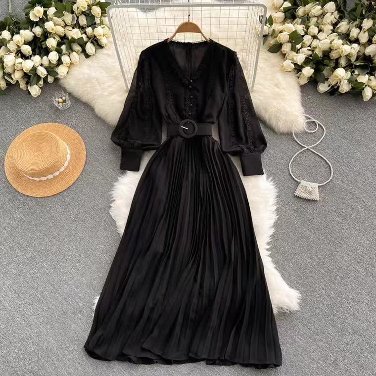 Black pleated maxi dress, V-neck, long sleeves, waist belt with circle buckle