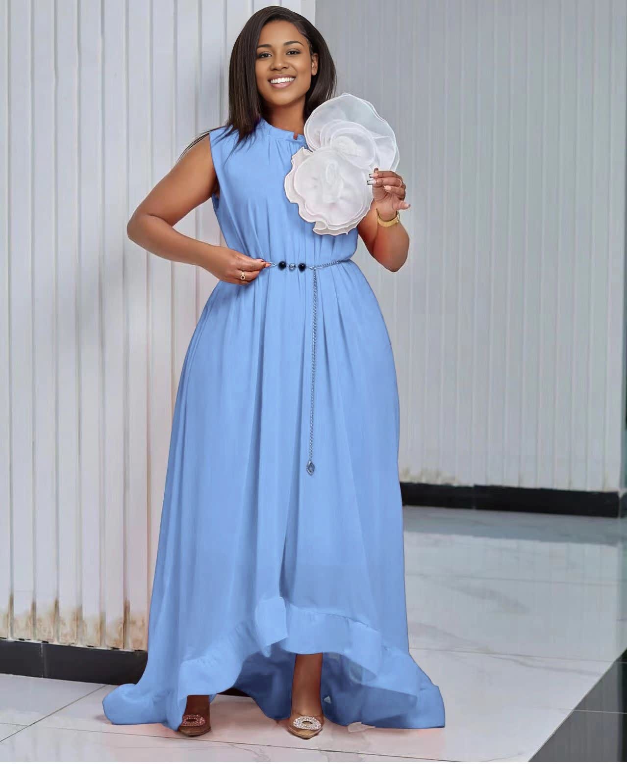 Sky-blue maxi dress, sleeveless high-low hem with floral applique and chain belt