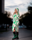 Leaf-print hooded knit midi dress with front slit, green and white pattern, long sleeves