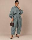 Teal two-piece set with balloon-sleeve cropped button shirt and pleated trousers