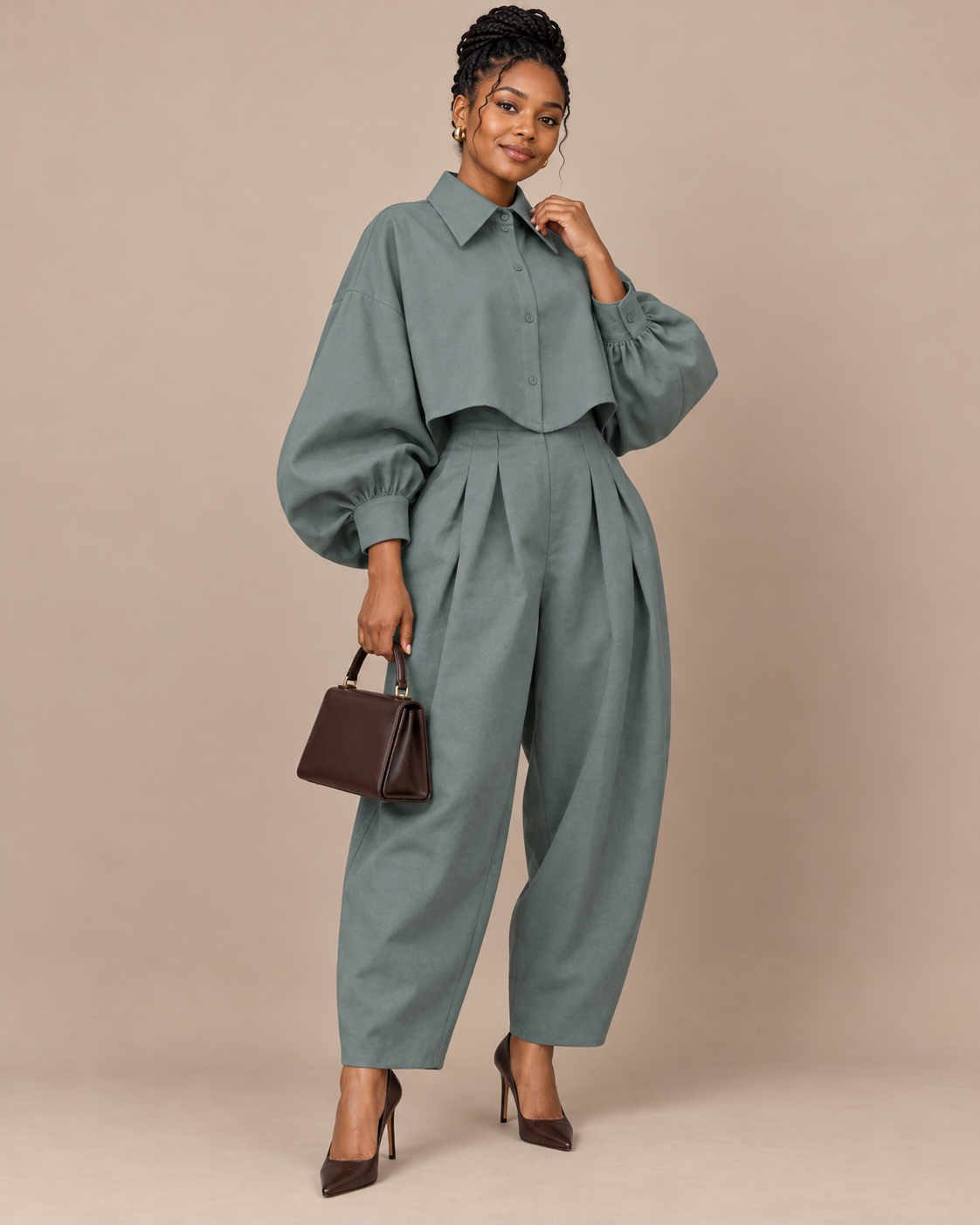 Teal two-piece set with balloon-sleeve cropped button shirt and pleated trousers