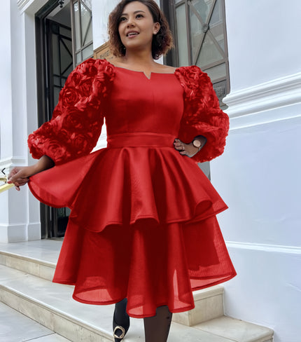 Red puff-sleeve layered dress with ruffled sleeves and tiered skirt
