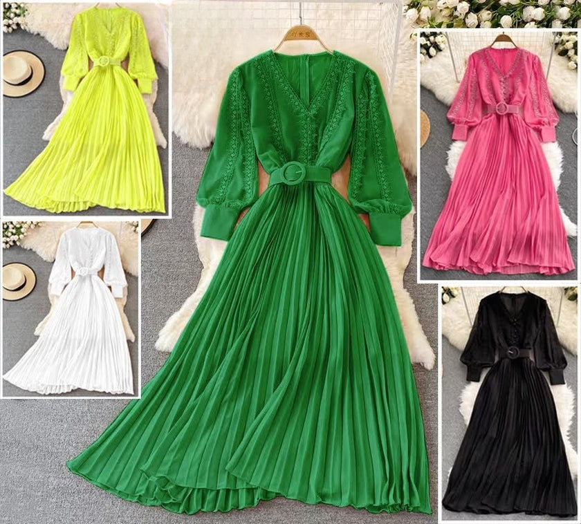 Green pleated maxi dress with V-neck, long sleeves, and waist belt detail