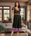 Dark green midi dress with striped puff sleeves and colorful trim at hem