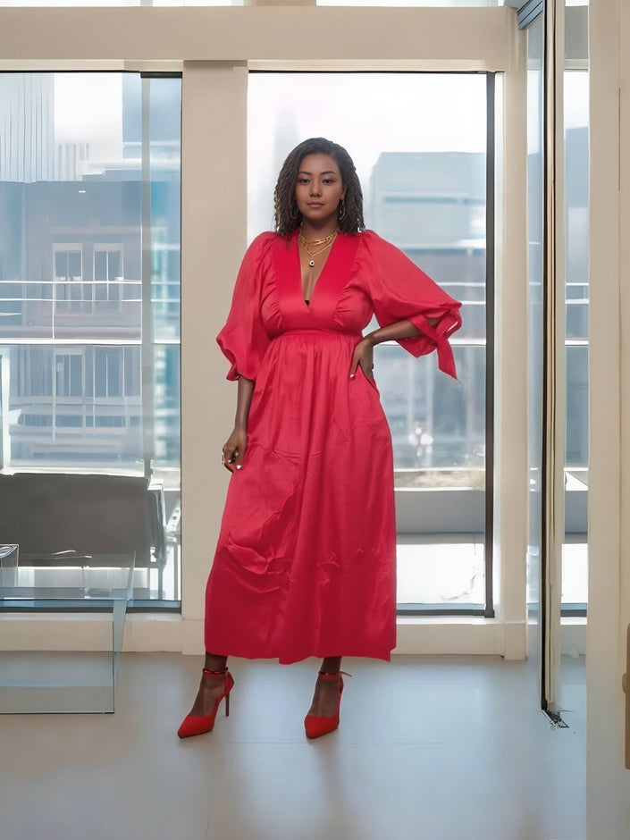Red midi dress with V-neck, voluminous puff sleeves, and cinched waist