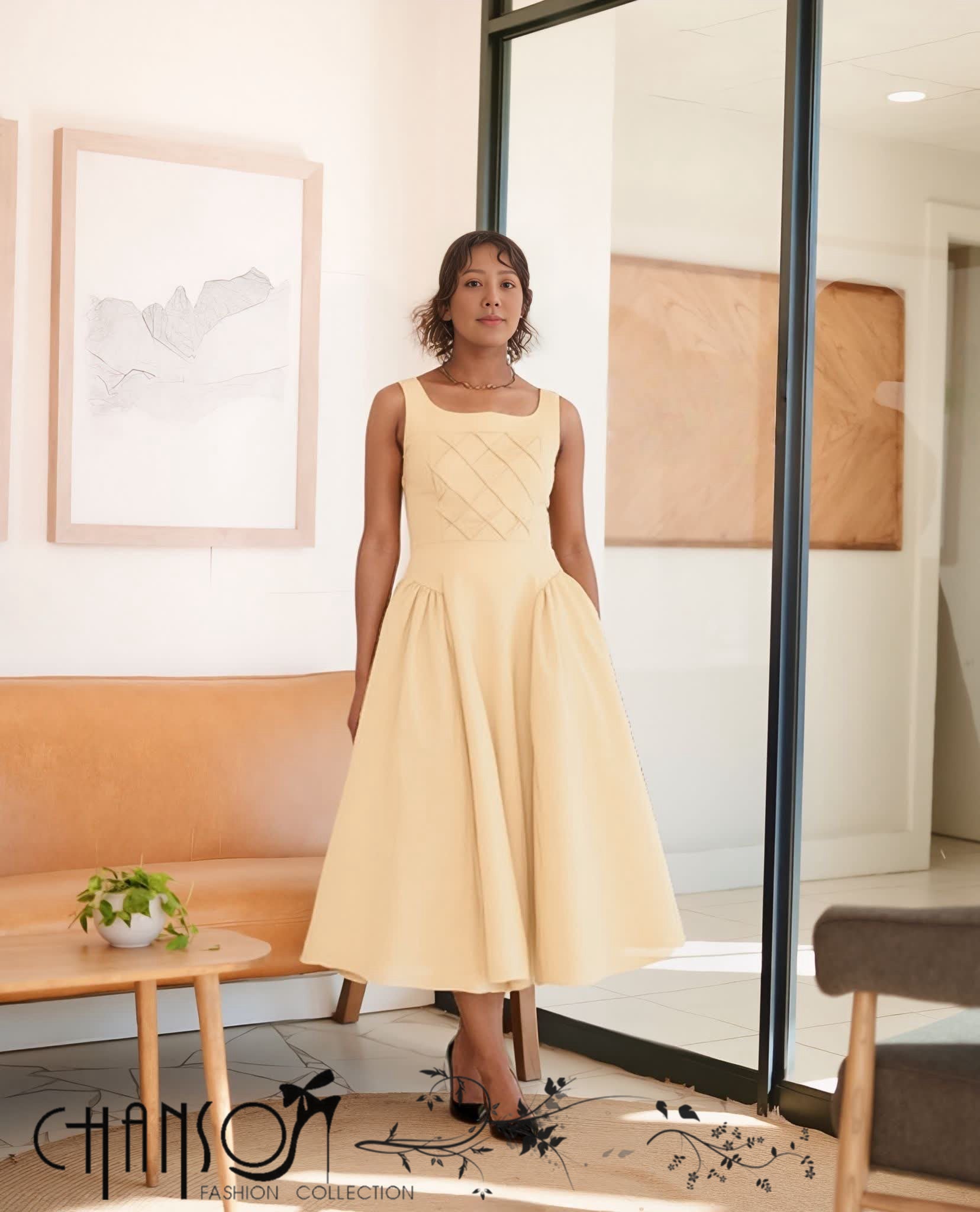 Sleeveless square-neck midi dress in light cream with quilted bodice and pleated A-line skirt
