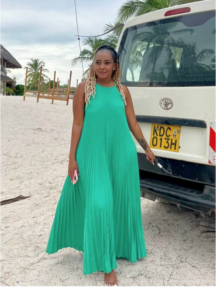 Bright green pleated spaghetti-strap maxi dress with a sleeveless scoop neckline