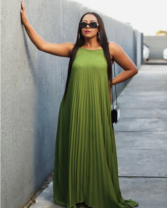 Olive-green pleated spaghetti-strap maxi dress with a relaxed drape