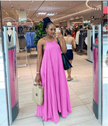 Pink pleated spaghetti-strap maxi dress with a sleeveless scoop neckline