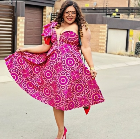 Ruffle one-shoulder African print dress in deep pink with layered ruffle bodice and swing skirt