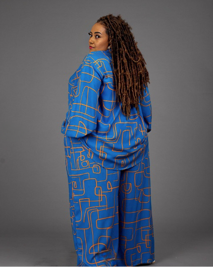 Geometric print shirt and pants set in blue, side view of long-sleeve shirt and pants