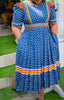 Short Sleeve Dress with Ruffle Hem, Geometric Pattern, and Stripe Accents